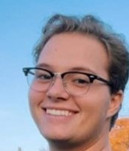 Cade E. Michael Hill